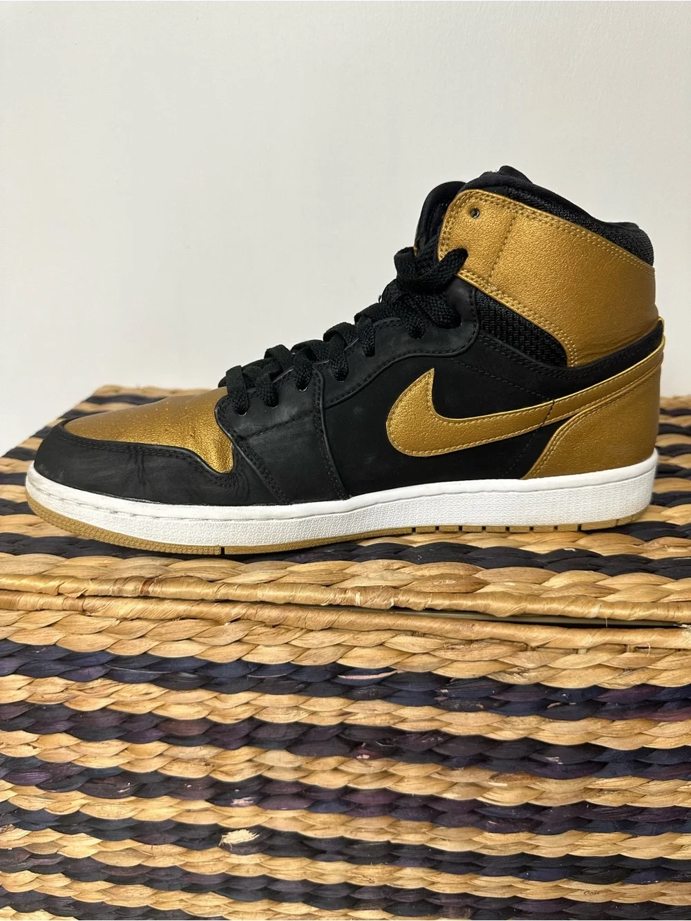 Jordan 1 High-Top Sneakers in Black and Gold